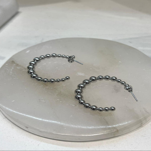 boucle d'oreille en acier sésanne